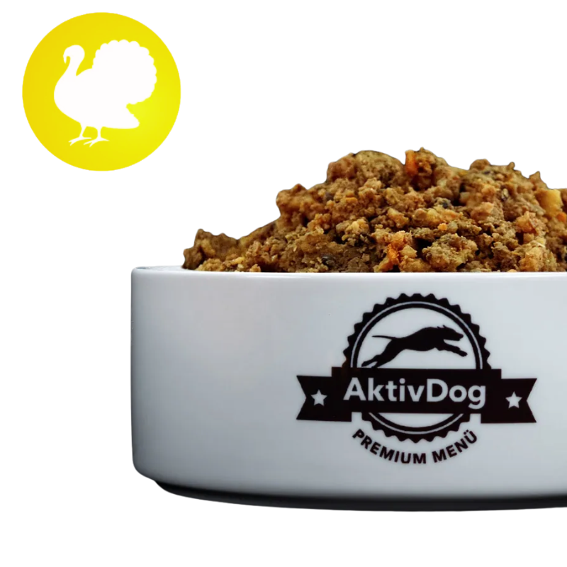 AktivDog Premium Hundefutter mit Pute, präsentiert in einer weißen Schüssel, gekennzeichnet mit einem Putenfleisch-Symbol.